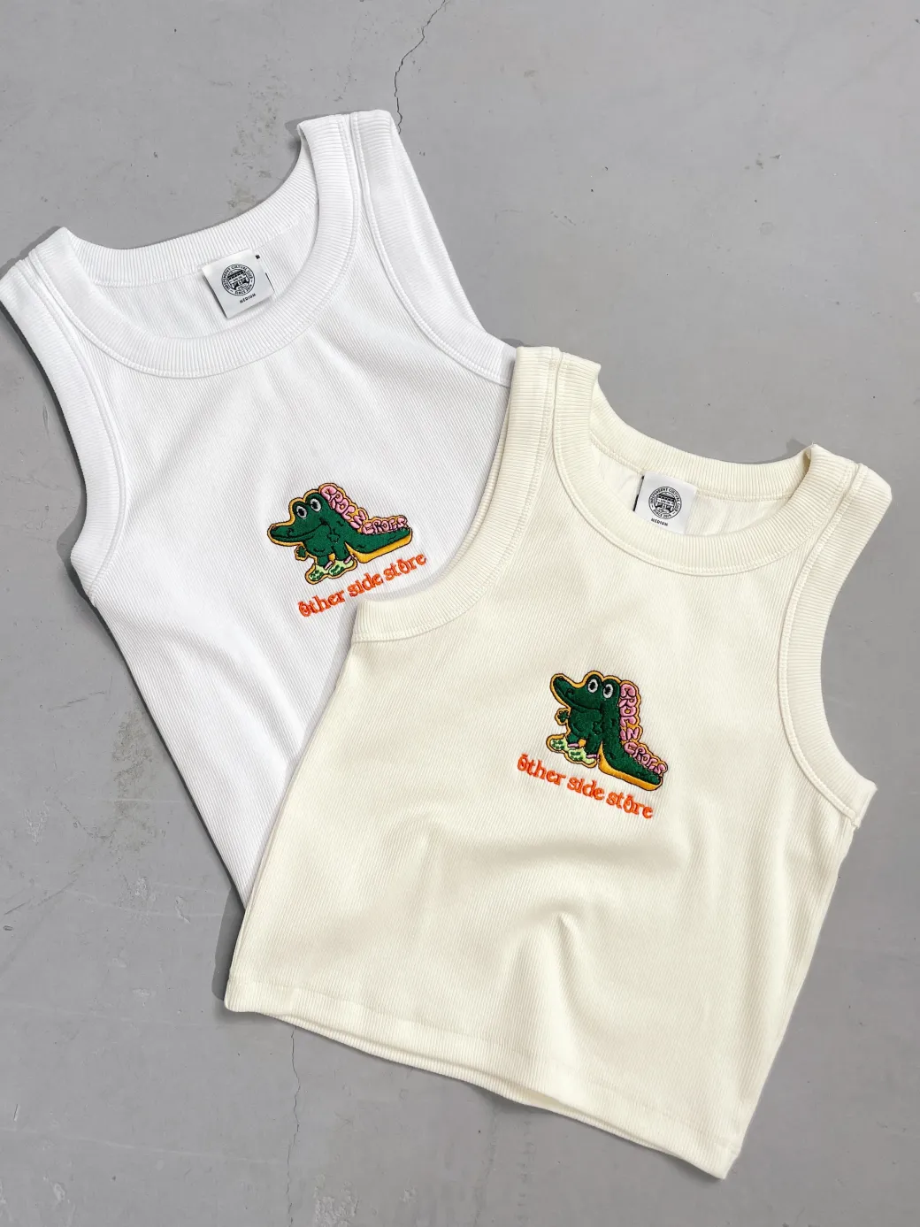 Other Side Store WMNS 'Crocs' Embroidered Crop Rib Tank - White